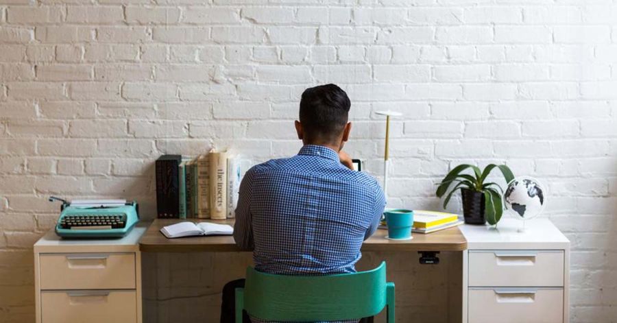 man working in home office